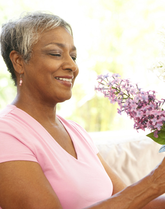 Senior Woman with Flowers Senior Woman with Flowers